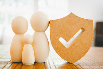 Shield protect icon and family model, Security protection and health insurance. The concept of...