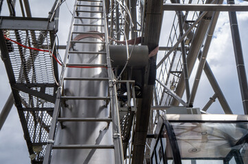 Service ladder for lifting a large metal lift