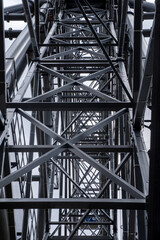 Fototapeta premium Part of a metal structure made of welded metal beams and pipes