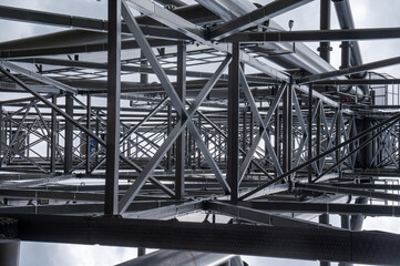 Part of a metal structure made of welded metal beams and pipes