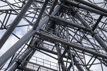 Part of a metal structure made of welded metal beams and pipes