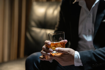 Businessmen in suits drinking  Celebrate whiskey.