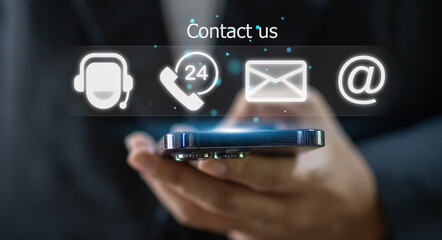 Human business ues smartphone with call center on screen contact us, email, address, operator,...