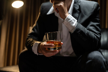 Businessmen in suits drinking  Celebrate whiskey.