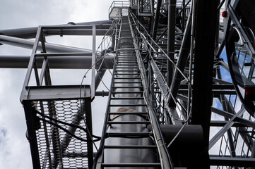 Service ladder for lifting a large metal lift