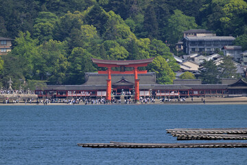 Itsukushima Shrine in Miyajima, Hiroshima Pref. The tablet on the torii reads 'Itsukushima Shrine'.