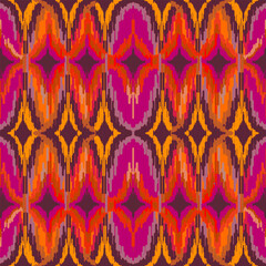 Fototapeta premium ikat ethnic seamless pattern. abstract ogee textured background for textile, wallpaper