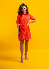 positive stylish caucasian girl isolated on yellow. stylish caucasian girl in studio. stylish caucasian girl on background. stylish caucasian girl wearing bright