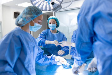 Doctor and assistant nurse operating for help patient from dangerous emergency case .Surgical...