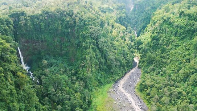 Aerial view of Coban Kapas Biru waterfall. East Java, Indonesia
