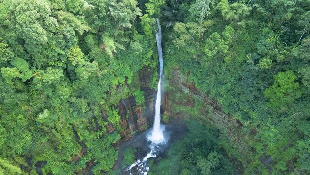 Aerial view of Coban Kapas Biru waterfall. East Java, Indonesia