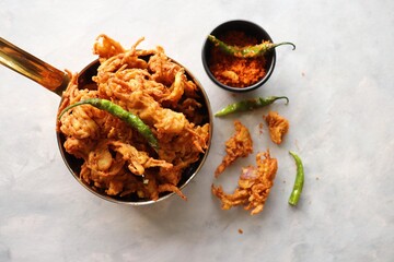 Fried onion pakode or Pyaj ke Pakore also known as Crispy Kanda bhaji, Bhajji, bujji. favorite...