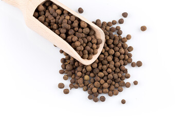 Wooden shovel with black peppercorn