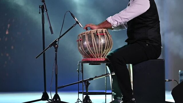 Man Playing Traditional Indian Musical Instrument Tabla, Indian twin-hand drums