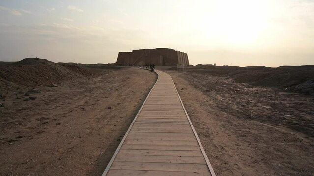 Passway Towards Ruins of UR, Ancient Ziggurat of UR Monument in Iraq at Sunset