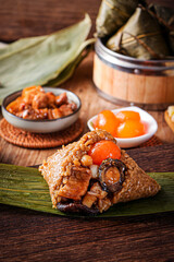 zongzi, rice dumplings,Made with glutinous rice and meat or egg yolk(Dates and Red Beans), wrapped in zong leaves, a common food for the Dragon Boat Festival in Asian countries.