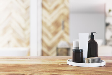 Front view of empty wooden table top in bathroom interior with blurred background and black bathroom accessories, product presentation concept, mockup. 3D rendering