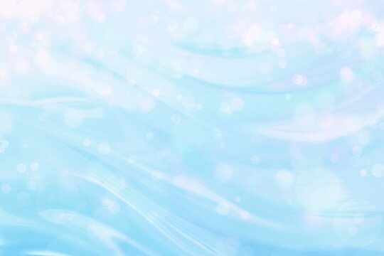 キラキラ輝くブルーのウェーブと光の背景