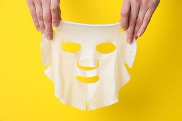 Concept of face and skin care with cosmetic mask