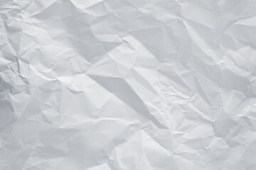 Obraz premium White crumpled paper texture background, clean white wrinkled paper, top view.