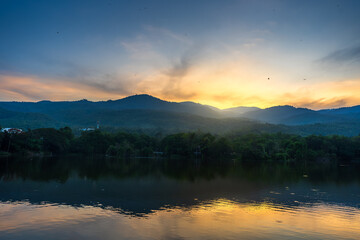 landscape lake views at Ang Kaew Chiang Mai  in nature forest Mountain views with evening blue dramatic sunset sky background