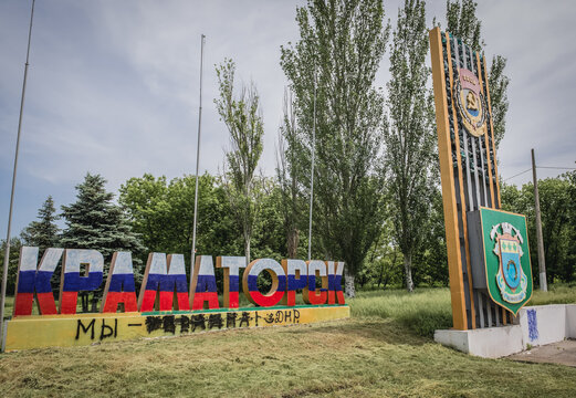 Kramatorsk, Ukraine - May 23, 2014: Kramatorsk town sign painted in russian flag during Russo-Ukrainian War in Donbas region