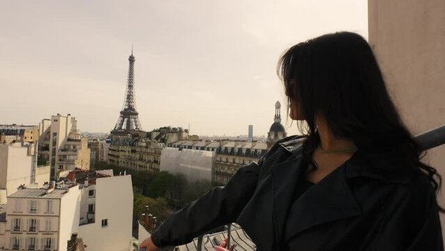Woman Standing on Balcony, Hotel, Eiffel Tower in Background, Parallax, Close Up Portrait, Over the Shoulder  