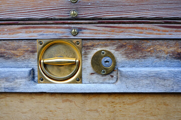 Brass Vintage Lock of Wooden Door.