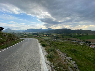 Asphalt road to old Bademli village and nature view