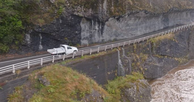Aerial: Ute car on the road in the South Island, New Zealand
