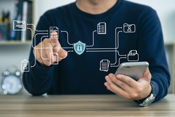 Businessman protecting personal data on smart phone, virtual screen interfaces. cyber security....