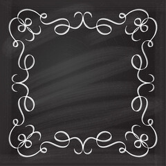 Vintage floral frame on a chalkboard background.