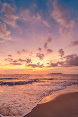 Fototapeta premium Tropical beach with smooth wave and sunset sky abstract background.