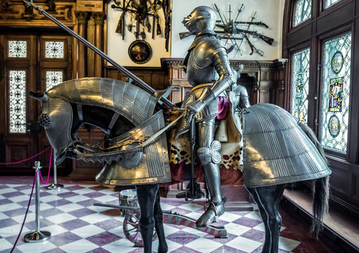 Sinaia, Romania - July 5, 2016: Full knight and horse armour in Grand Armory Hall of Peles Castle near Sinaia