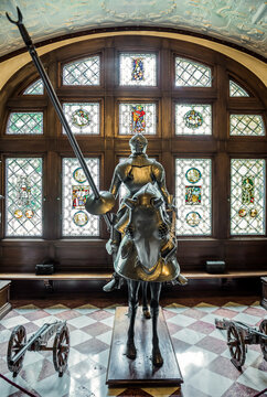 Sinaia, Romania - July 5, 2016: Full knight and horse armour in Grand Armory Hall of Peles Castle near Sinaia town