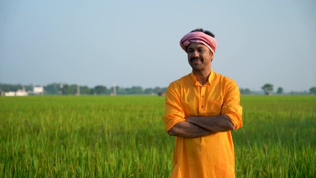 The proud Indian farmer stands as an example of strength, embodying the rich agricultural heritage of the country and showcasing the pride and respect he holds for his profession.




