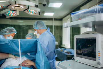 cardiac monitor during childbirth in the operating room