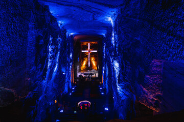 underground salt cathedral of zipaquira in colombia with chandelier and cross of light - obrazy, fototapety, plakaty
