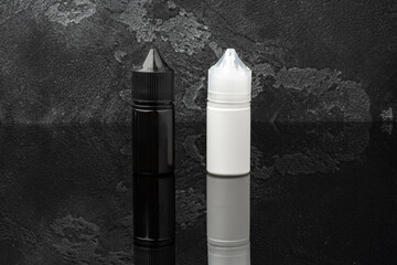 Refill liquid for electronic cigarettes on gray background