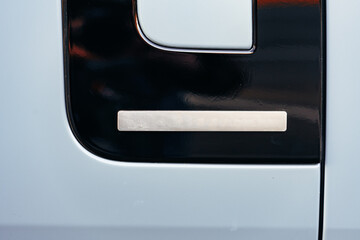 Detail of metal fender of a luxury car