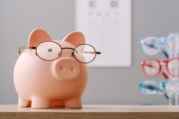 Piggy bank wearing new prescription glasses