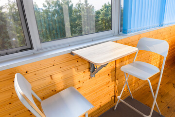 folding wooden table fixed on the wall.