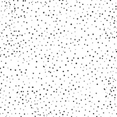 Seamless abstract polka dot pattern. Black hand drawn drip points on white background. Stone terrazzo texture, ink blots stain, grain, paint splash, spray effect. Vector grunge splattered illustration