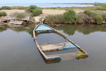 Boats cemetery at Delta de l'Ebre. Abandoned old wooden boats.