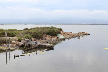 Boats cemetery at Delta de l'Ebre. Abandoned old wooden boats.