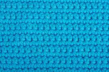 Blue knitted wool textured background