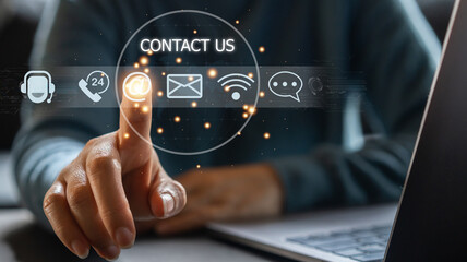 Hand of call center touching on screen contact us, email, address, operator, customer, support,...