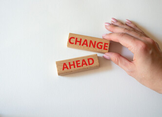 Change ahead symbol. Wooden blocks with words Change ahead. Businessman hand. Beautiful white background. Business and Change ahead concept. Copy space.