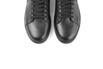 black leather sneakers on a white background