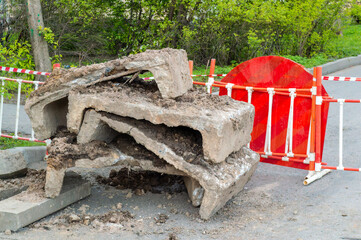 Old concrete structures recovered from the ground during the repair of communal infrastructure